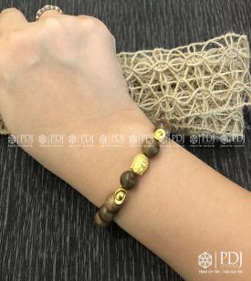Vòng Gỗ trầm 9 ly charm Phật, Đĩnh Vàng 24K Vòng Gỗ trầm 9 ly charm Phật, Đĩnh Vàng 24K