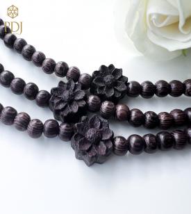 Chuỗi vòng tay trầm mix hoa sen Chuỗi vòng tay trầm mix hoa sen